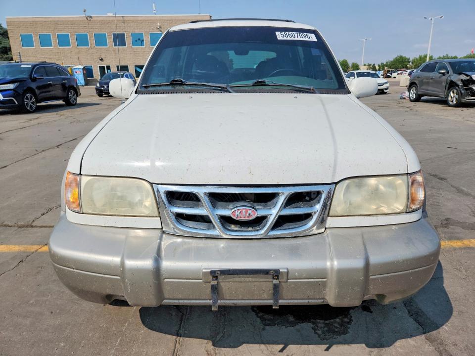 2000 Kia Sportage VIN KNDJA7238Y5644006 COPART salvage auction — SIDE, CO - PUBLIC - SALVAGE TITLE, sold $325 on 2026-07-29 (photo 5)