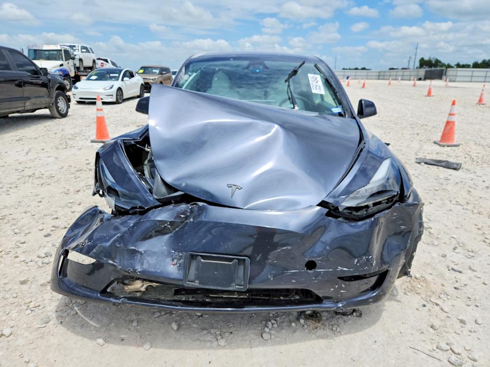 2024 Tesla Model y VIN 7SAYGDEE4RA283351 COPART salvage auction — FRONT END, Tx - Salvage Vehicle Title, sold $7,100 on 2026-07-16 (photo 5)