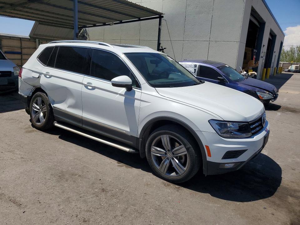 2020 Volkswagen Tiguan VIN 3VV3B7AX7LM130839 COPART salvage auction — REAR END, TX - SALVAGE VEHICLE TITLE (P), sold $6,900 on 2026-08-14 (photo 4)