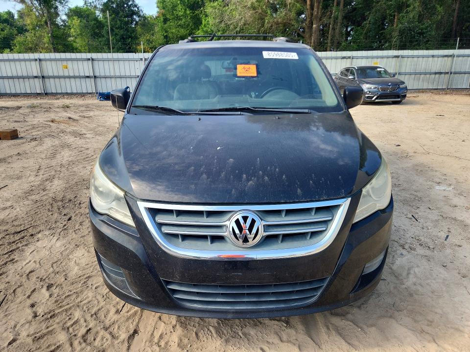 2011 Volkswagen Routan VIN 2V4RW3DG8BR717680 COPART salvage auction — MINOR DENT/SCRATCHES, Fl - Certificate Of Title, sold $125 on 2026-07-31 (photo 5)