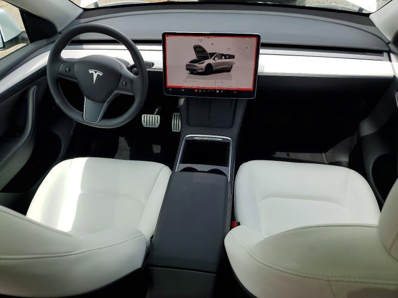 2023 Tesla Model y VIN 7SAYGDEF7PF788423 COPART salvage auction — REAR END, Salvage Title, sold $13,500 on 2026-07-23 (photo 8)