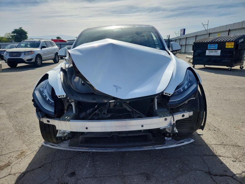 2021 Tesla Model y VIN 5YJYGAEEXMF217863 COPART salvage auction — FRONT END, Ca - Salvage Certificate, sold $7,300 on 2026-07-10 (photo 5)