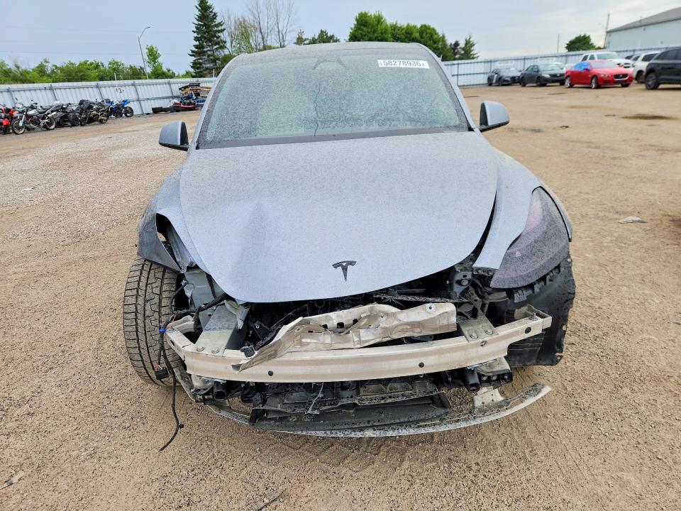 2024 Tesla Model y VIN 7SAYGDEE4RF213397 COPART salvage auction — FRONT END, On - Permit Salvage, sold $15,750 on 2026-07-28 (photo 5)