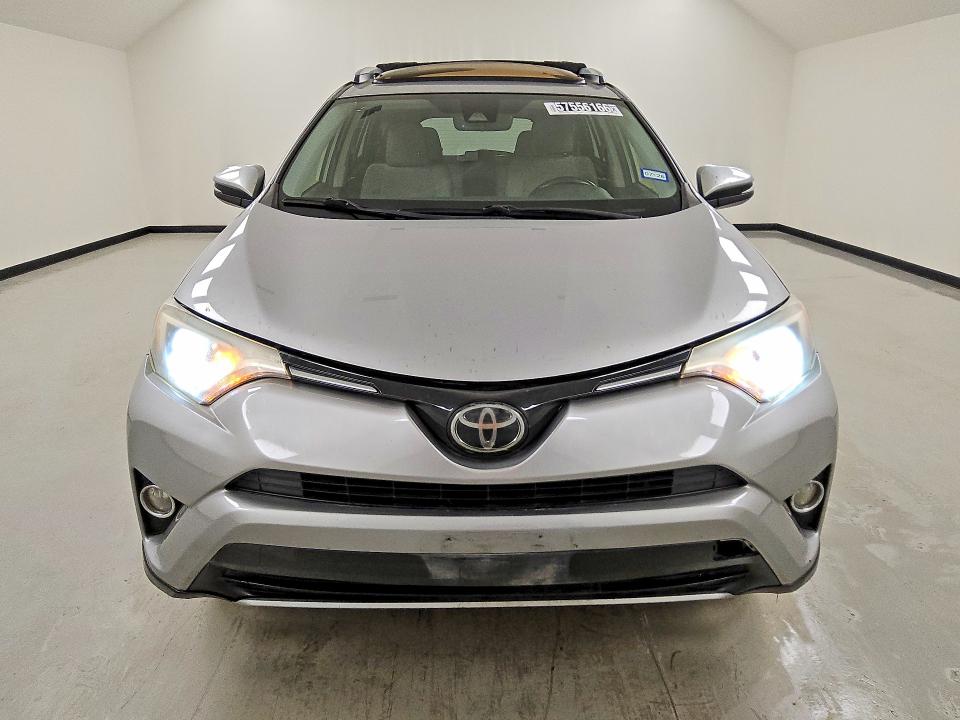 2018 Toyota Rav4 VIN JTMWFREV6JJ194806 COPART salvage auction — REAR END, TX - CERTIFICATE OF TITLE, sold $6,300 on 2026-07-14 (photo 5)