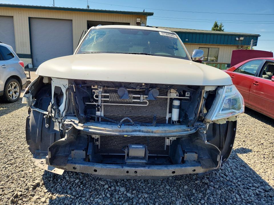 2018 Nissan Armada VIN JN8AY2NE7J9733628 COPART salvage auction — SIDE, Or - Salvage Title Certificate, sold $1,800 on 2026-07-21 (photo 5)