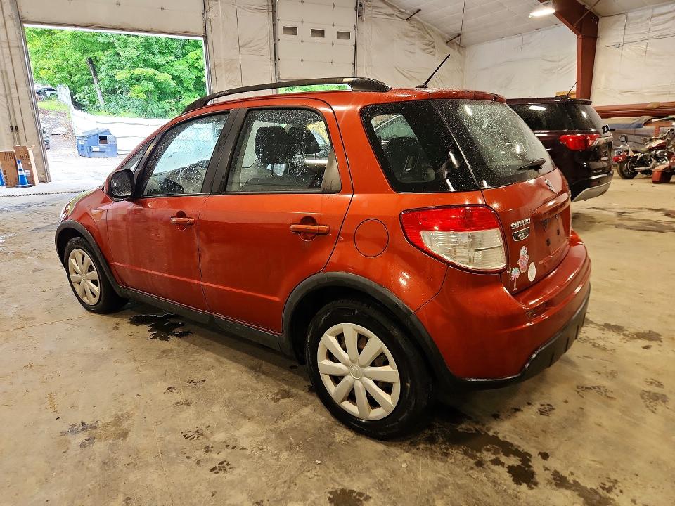 2010 Suzuki Sx4 VIN JS2YB5A33A6300218 COPART salvage auction — MINOR DENT/SCRATCHES, Nc - Parts Only-Record Of Sale, sold $250 on 2026-07-08 (photo 2)