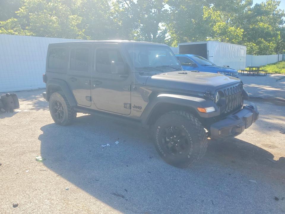 2021 Jeep Wrangler unlimited VIN 1C4HJXDN6MW617890 COPART salvage auction — NORMAL WEAR, Mo - Certificate Of Title, sold $19,900 on 2026-07-02 (photo 4)