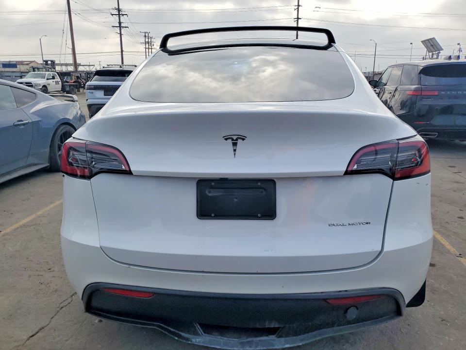 2023 Tesla Model y VIN 7SAYGAEE1PF881184 COPART salvage auction — REAR END, Ca - Salvage Certificate, sold $14,400 on 2026-07-29 (photo 6)