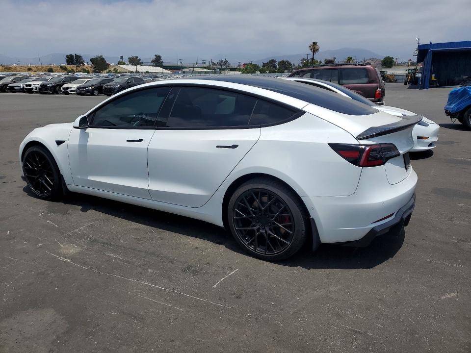 2021 Tesla Model 3 VIN 5YJ3E1EB2MF044720 COPART salvage auction — REAR END, Ca - Salvage Certificate, sold $7,500 on 2026-07-08 (photo 2)