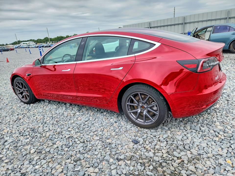 2019 Tesla Model 3 VIN 5YJ3E1EA9KF308357 COPART salvage auction — SIDE, Fl - Cert Of Title Slvg Rebuildable, sold $6,600 on 2026-07-07 (photo 2)