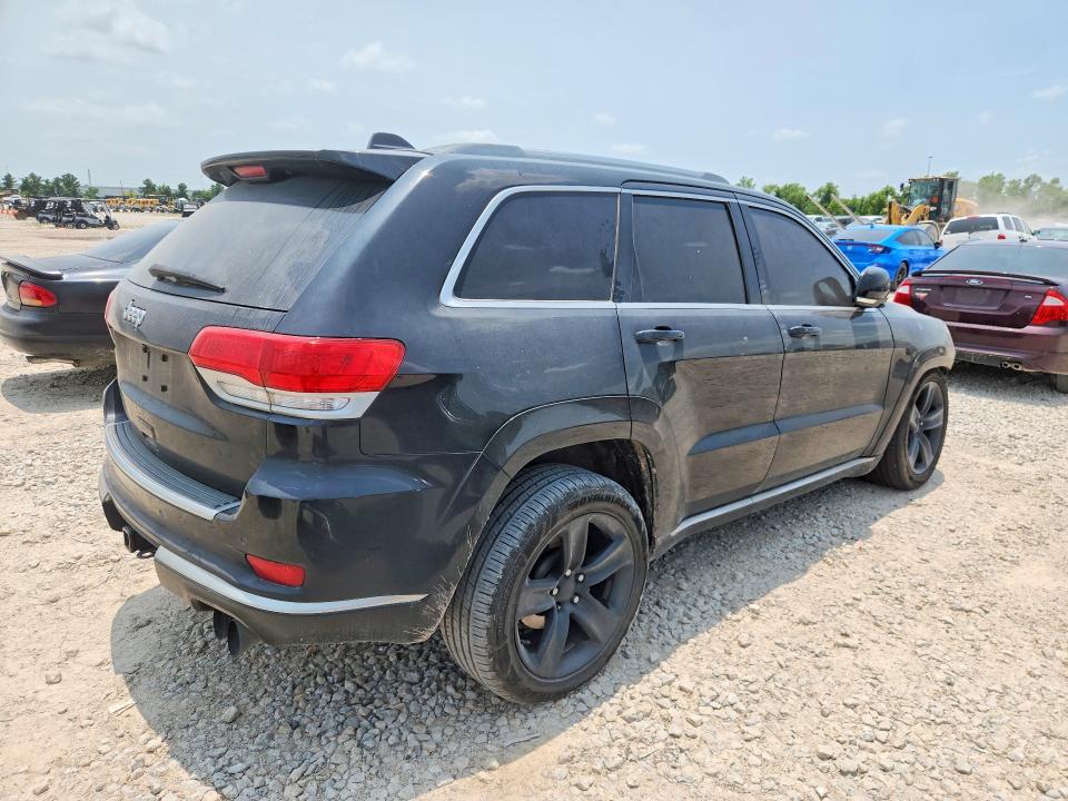 2015 Jeep VIN 1C4RJFJT3FC676501 COPART salvage auction — WATER/FLOOD, Tx - Salvage Title-Flood Damage, sold $875 on 2026-07-02 (photo 3)