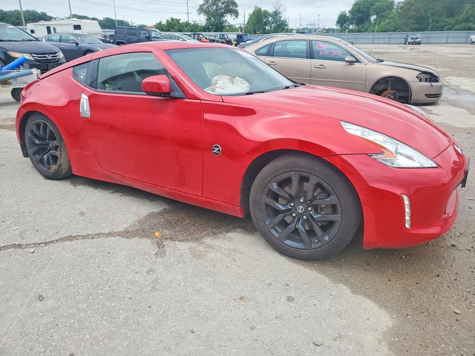 2016 Nissan VIN JN1AZ4EH3GM937396 COPART salvage auction — SIDE, Ia - Cert Of Title-Salvage Title, sold $2,850 on 2026-07-17 (photo 4)