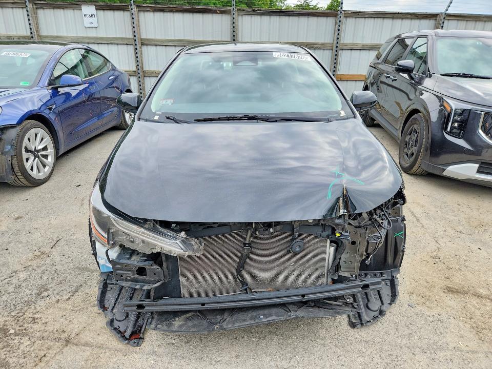 2023 Toyota Corolla VIN JTDB4MEE3PJ005741 COPART salvage auction — FRONT END, FL - CERTIFICATE OF TITLE, sold $7,900 on 2026-07-20 (photo 5)