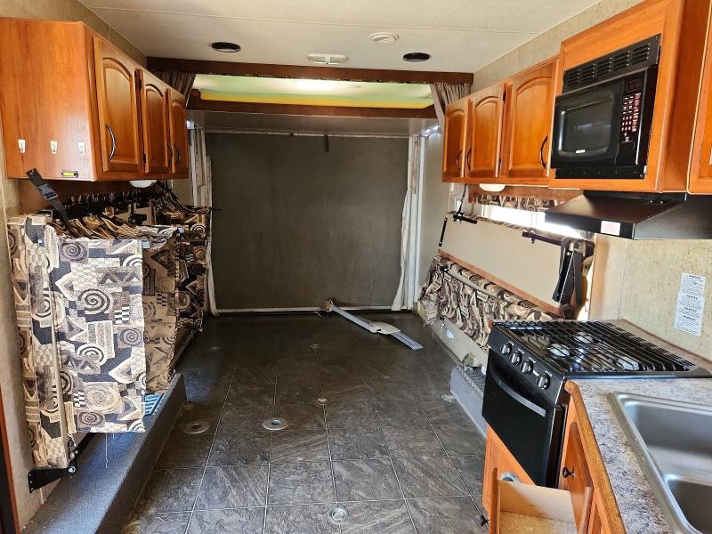 2008 Mitsubishi VIN 5LZBE26208R007037 COPART salvage auction — UNDERCARRIAGE, Ca - Salvage Certificate, sold $1,300 on 2026-07-23 (photo 6)