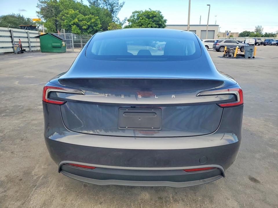 2024 Tesla Model 3 VIN 5YJ3E1EA7RF849613 COPART salvage auction — DAMAGE HISTORY, Fl - Cert Of Title Slvg Rebuildable (P), sold $12,600 on 2026-07-20 (photo 6)