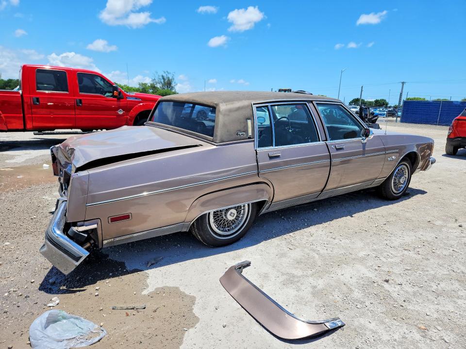 1984 Oldsmobile 98 VIN 1G3AG69Y6EM871948 COPART salvage auction — REAR END, Fl - Cert Of Ttl-Rebuilt&Slvg Rbld, sold $275 on 2026-07-29 (photo 3)