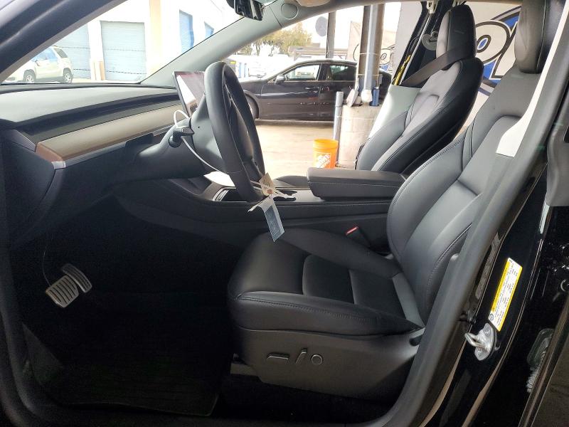 2024 Tesla Model y VIN 7SAYGDEFXRF022544 COPART salvage auction — SIDE, Ca - Salvage Certificate, sold $6,300 on 2026-07-23 (photo 7)