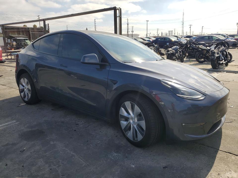 2023 Tesla Model y VIN 7SAYGDEE0PF925676 COPART salvage auction — FRONT END, Ca - Salvage Certificate, sold $9,400 on 2026-07-02 (photo 4)