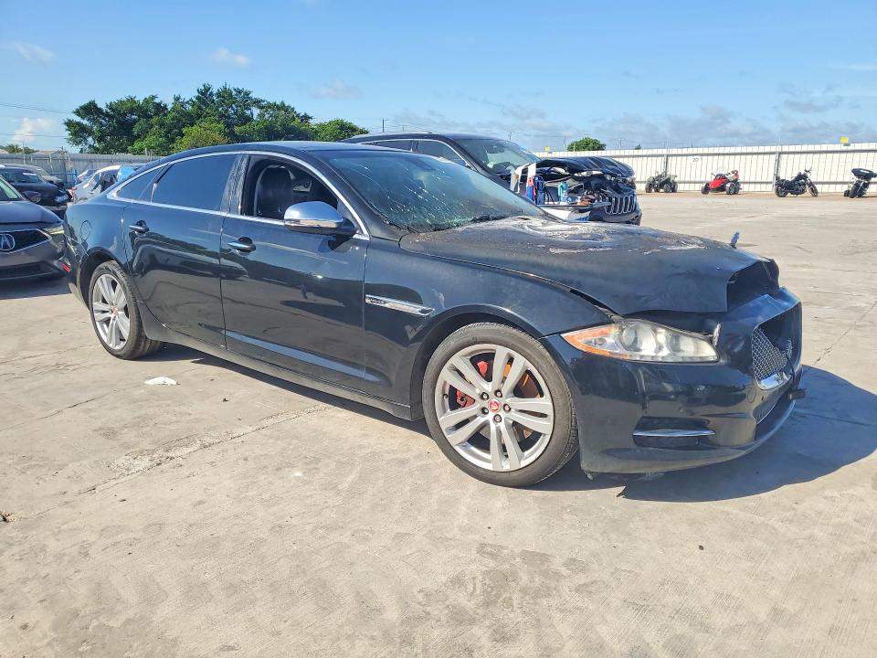 2015 Jaguar Xj series VIN SAJWJ2GD4F8V81199 COPART salvage auction — ENGINE BURN, Tx - Salvage Vehicle Title, sold $550 on 2026-07-02 (photo 4)