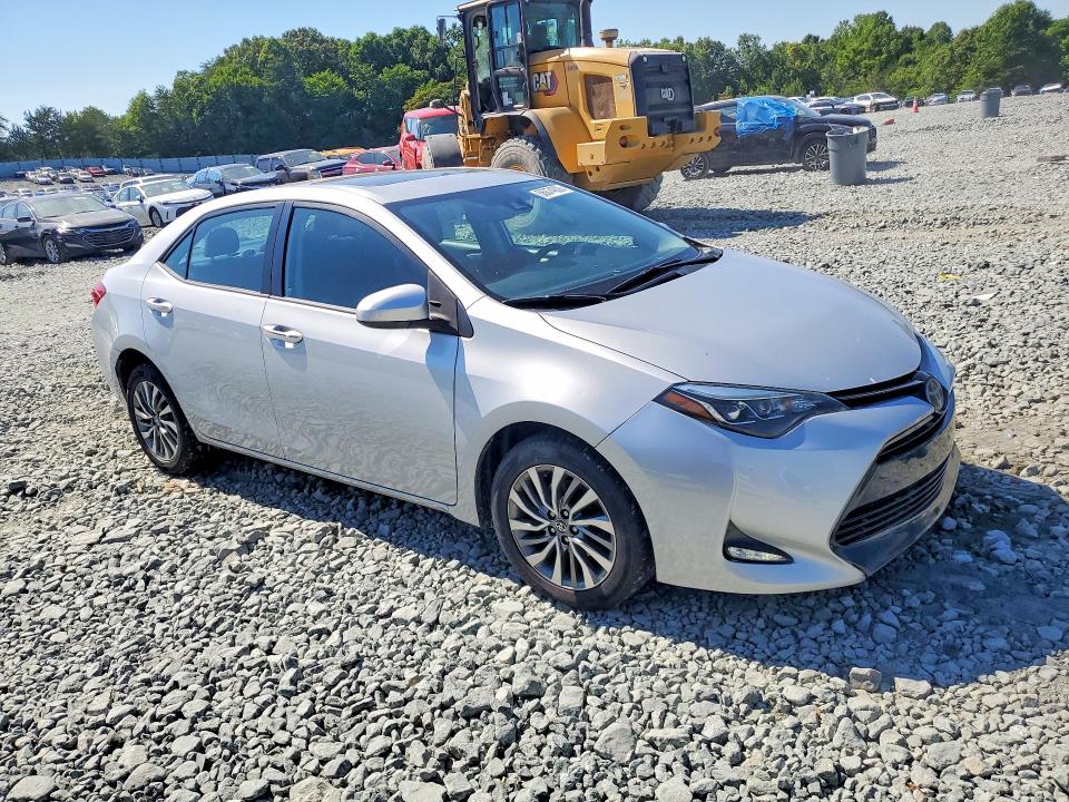 2017 Toyota Corolla VIN 5YFBURHE2HP636518 COPART salvage auction — SIDE, Nc - Salvage Certificate Of Title, sold $500 on 2026-07-29 (photo 4)
