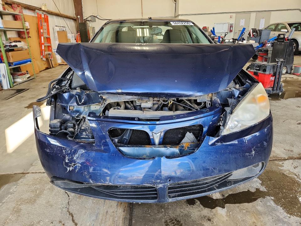 2009 Pontiac G6 VIN 1G2ZJ57B994234933 COPART salvage auction — FRONT END, AB - BOS - SALVAGE, sold $150 on 2026-08-20 (photo 5)