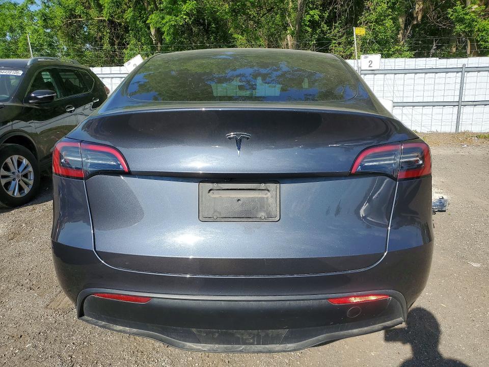 2023 Tesla Model y VIN LRWYGDFD2PC162816 COPART salvage auction — UNDERCARRIAGE, On - Permit No Brand - Unfit, sold $11,700 on 2026-07-02 (photo 6)