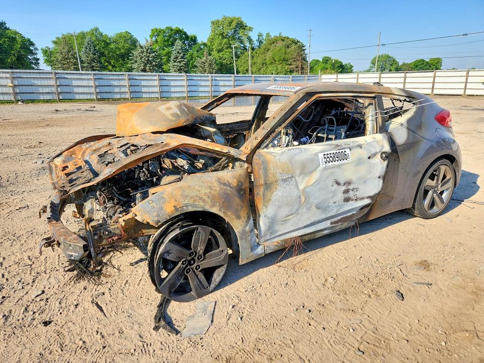 2016 Hyundai Veloster VIN KMHTC6AD4GU303242 COPART salvage auction — BURN, MI - DEALER ONLY-REBUILT SALVAGE, sold $175 on 2026-07-22 (photo 1)