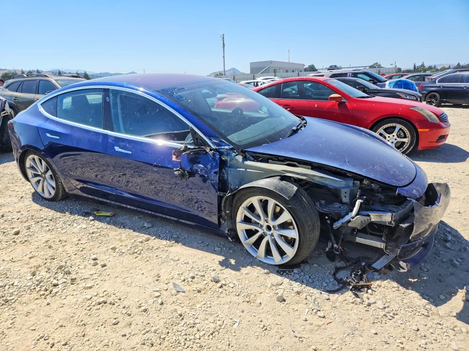 2017 Tesla Model 3 VIN 5YJ3E1EA2HF001976 COPART salvage auction — FRONT END, CA - SALVAGE CERTIFICATE, sold $4,100 on 2026-07-14 (photo 4)