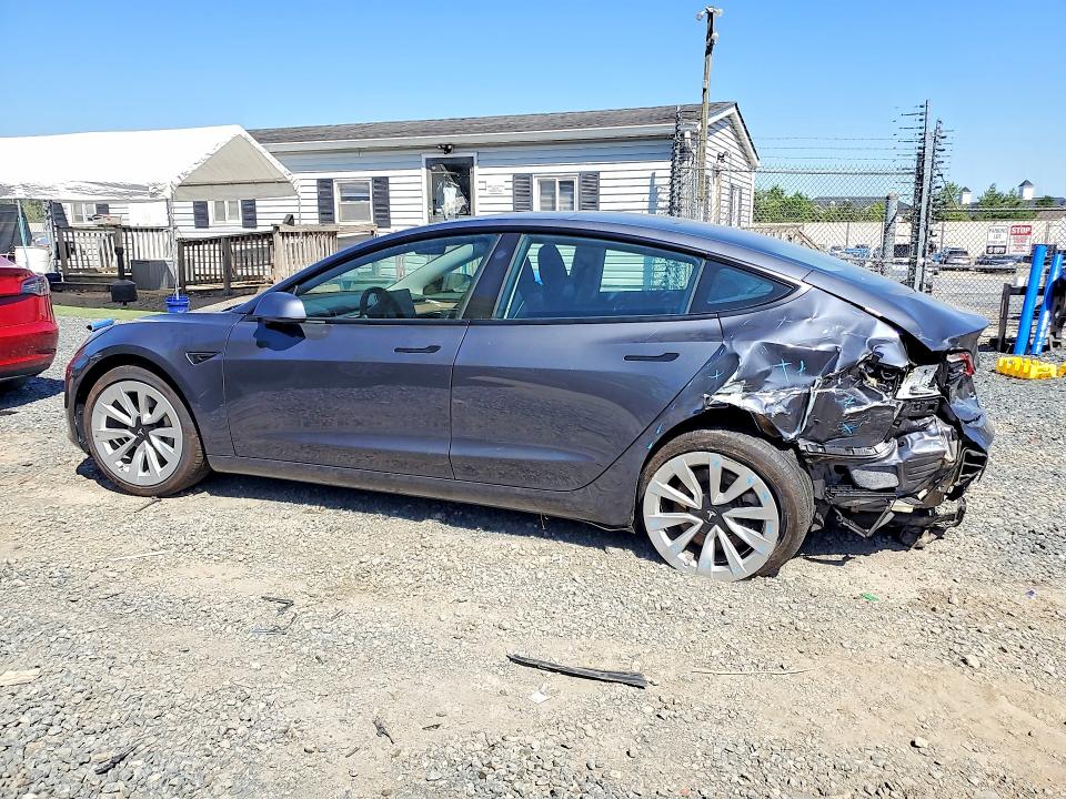 2023 Tesla Model 3 VIN 5YJ3E1EA6PF610258 COPART salvage auction — REAR END, Salvage Title, sold $5,400 on 2026-07-09 (photo 2)
