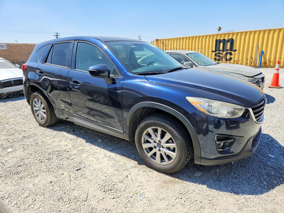 2016 Mazda VIN JM3KE2CY0G0834990 COPART salvage auction — SIDE, Ca - Salvage Certificate, sold $2,950 on 2026-07-15 (photo 4)