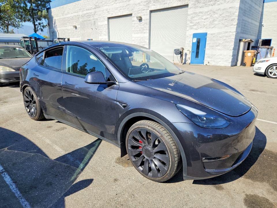 2024 Tesla Model y VIN 7SAYGDEFXRF020194 COPART salvage auction — REAR END, Ca - Salvage Certificate, sold $8,100 on 2026-07-28 (photo 4)