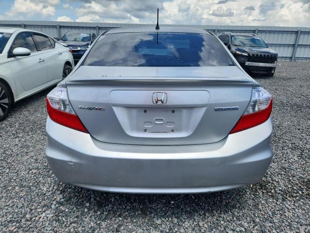 2012 Honda Civic VIN JHMFB4F21CS008751 COPART salvage auction — SIDE, Fl - Cert Of Title Slvg Rebuildable, sold $875 on 2026-07-14 (photo 6)
