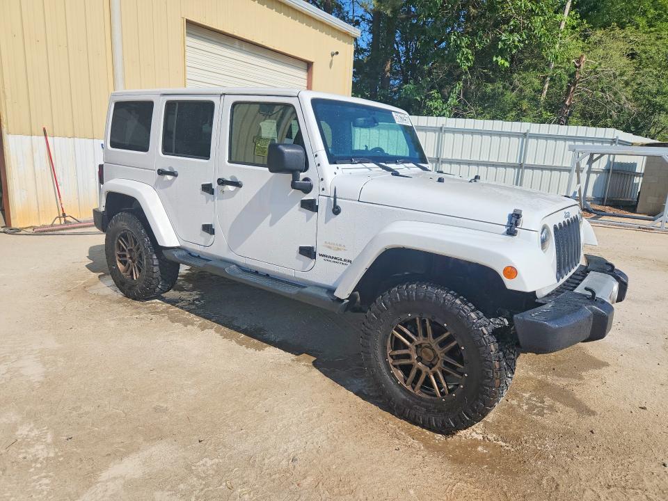 2014 Jeep Wrangler unlimited VIN 1C4BJWEG5EL150710 COPART salvage auction — MINOR DENT/SCRATCHES, Nc - Dealer Only Clean Title, sold $6,300 on 2026-07-02 (photo 4)