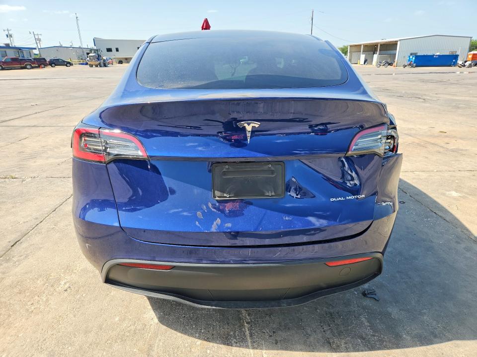 2023 Tesla Model y VIN 7SAYGDEEXPA064469 COPART salvage auction — SIDE, TX - SALVAGE VEHICLE TITLE (P), sold $5,900 on 2026-07-16 (photo 6)
