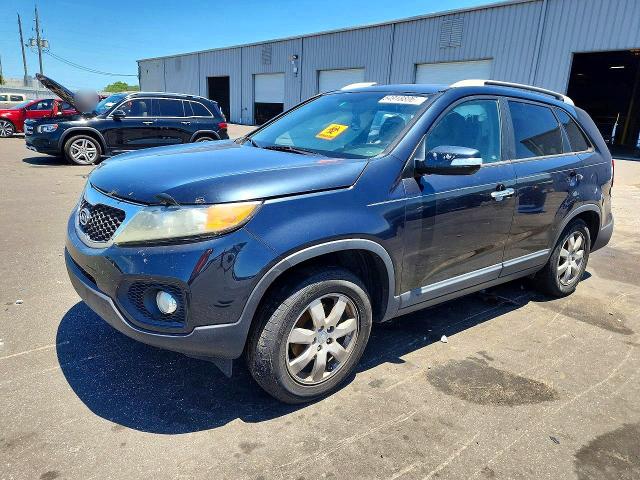 2012 Kia Sorento VIN 5XYKT4A60CG284013 COPART salvage auction — SIDE, Fl - Cert Of Title Slvg Rebuildable, sold $575 on 2026-07-13 (photo 1)