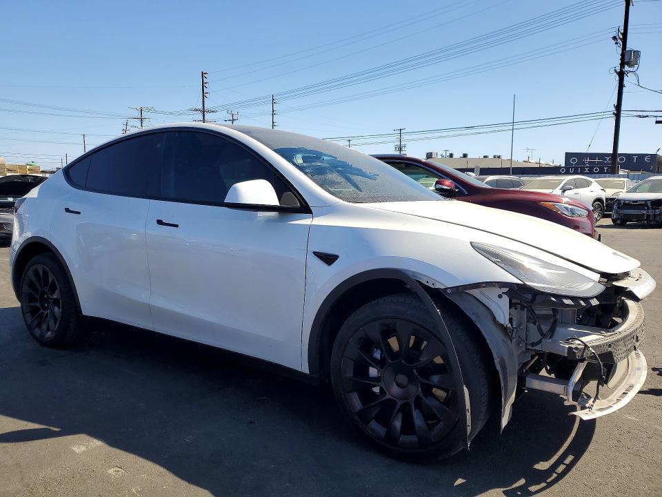 2022 Tesla Model y VIN 7SAYGDEE2NF328428 COPART salvage auction — SIDE, Ca - Salvage Certificate, sold $8,000 on 2026-07-22 (photo 4)