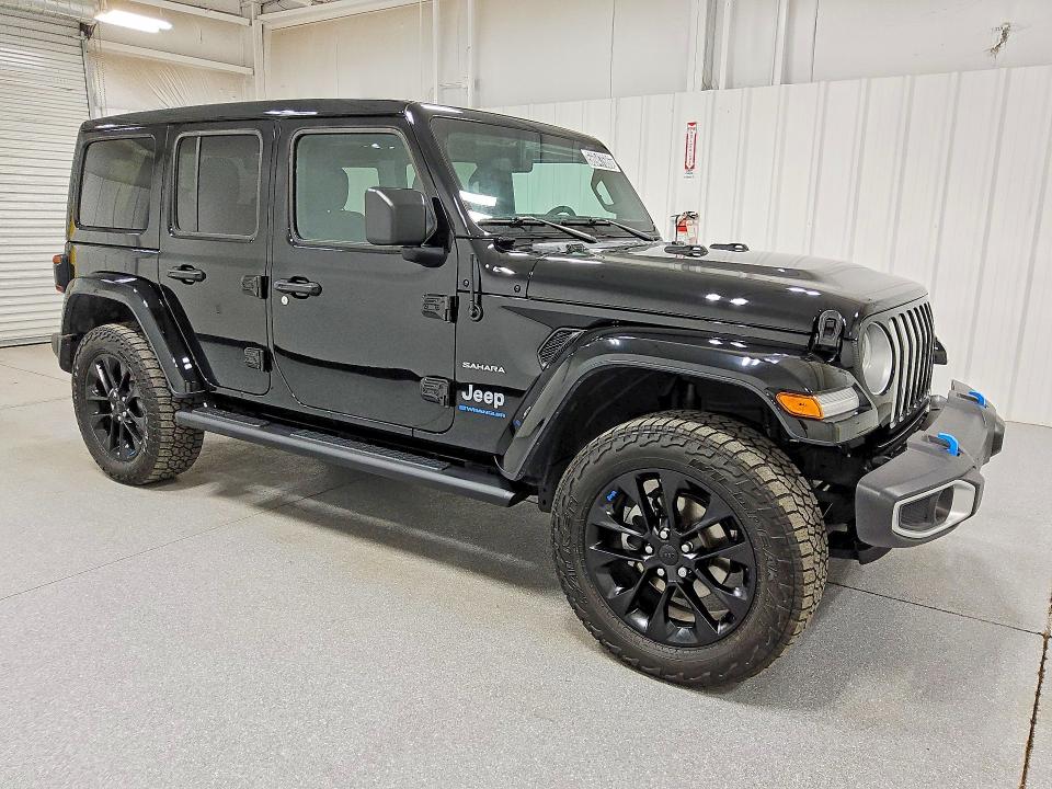 2023 Jeep Wrangler / VIN 1C4JJXP67PW621912 COPART salvage auction — MINOR DENT/SCRATCHES, MO - CERTIFICATE OF TITLE, sold $20,500 on 2026-07-09 (photo 4)