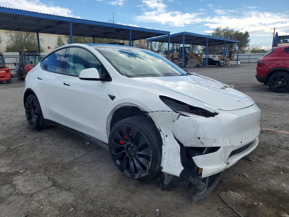 2022 Tesla Model y VIN 7SAYGDEF8NF489990 COPART salvage auction — FRONT END, Nv - Salvage Title, sold $9,600 on 2026-07-30 (photo 4)
