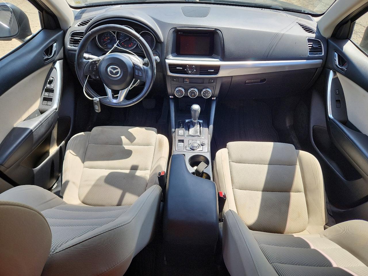 2016 Mazda CX-5 VIN JM3KE2CYXG0886479 COPART salvage auction — Water/Flood, LA - CERT OF TITLE-SALVAGE FLOOD, sold $2,100 on 2026-07-09 (photo 8)