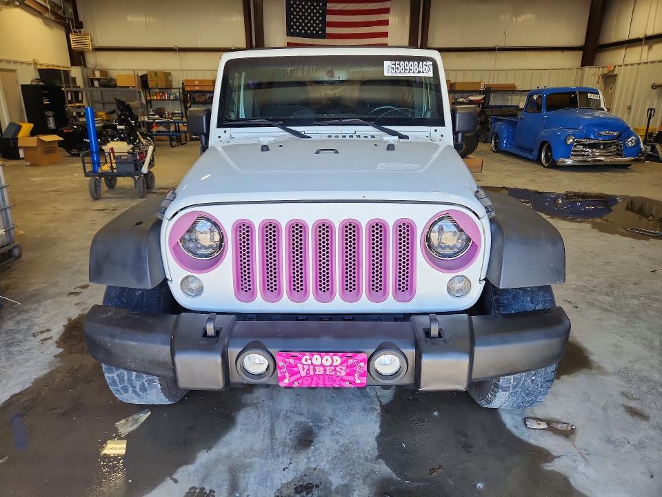 2014 Jeep Wrangler unlimited VIN 1C4BJWDG6EL113215 COPART salvage auction — NORMAL WEAR, In - Certificate Of Title, sold $1,600 on 2026-07-09 (photo 5)