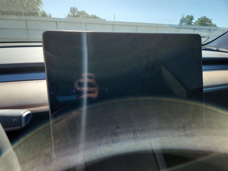 2023 Tesla Model 3 VIN 5YJ3E1EA6PF583983 COPART salvage auction — REAR END, CA - SALVAGE CERTIFICATE, sold $225 on 2026-07-24 (photo 9)