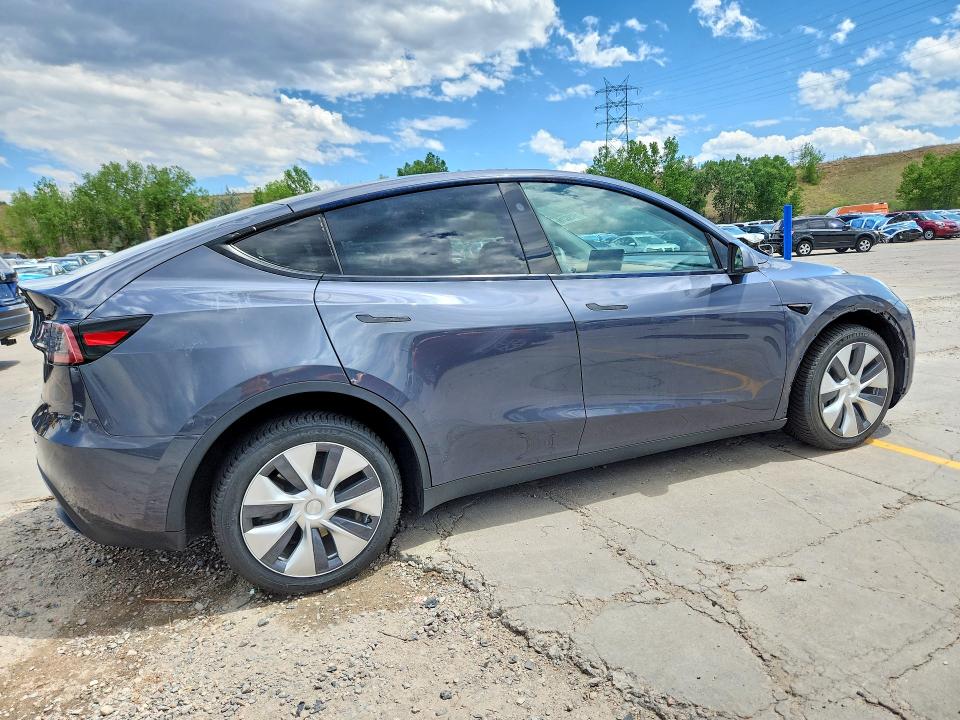2023 Tesla Model y VIN 7SAYGDEE8PF935484 COPART salvage auction — SIDE, Co - Public - Salvage Title, sold $11,300 on 2026-09-04 (photo 3)