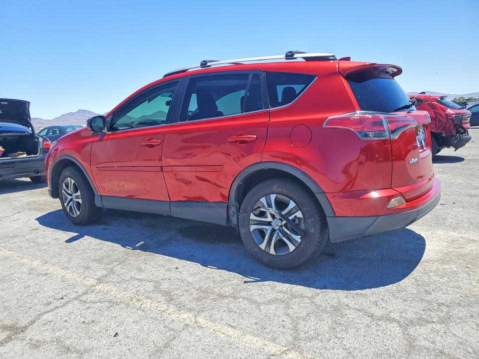 2016 Toyota Rav 4 VIN JTMZFREV4GJ081099 COPART salvage auction — SIDE, NV - SALVAGE TITLE, sold $6,300 on 2026-07-27 (photo 2)