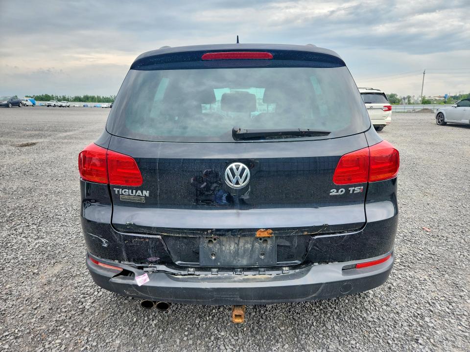 2014 Volkswagen Tiguan VIN WVGKV3AX1EW616362 COPART salvage auction — REAR END, On - Permit No Brand - Unfit, sold $825 on 2026-08-06 (photo 6)