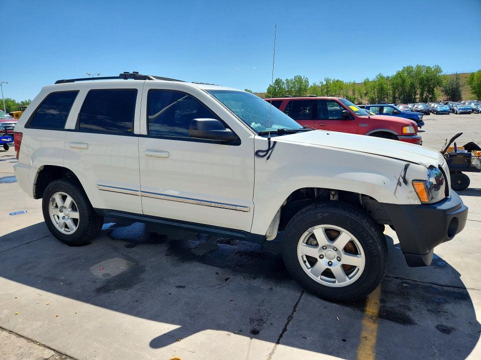 2010 Jeep Grand cherokee VIN 1J4PR4GK5AC127338 COPART salvage auction — SIDE, Co - Salvage Title, sold $825 on 2026-07-29 (photo 4)