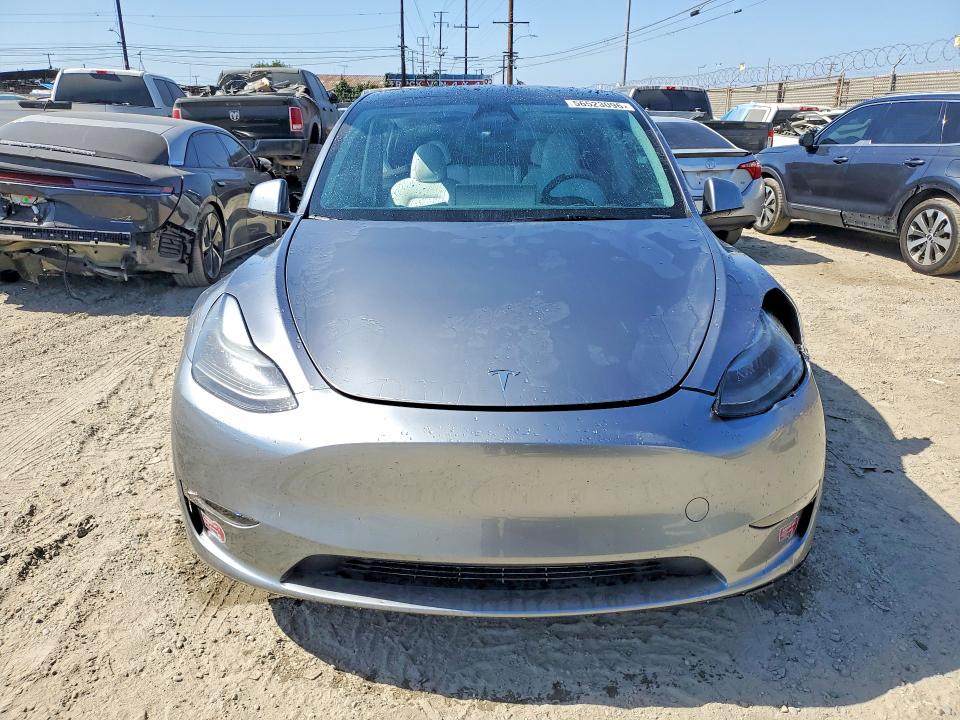 2024 Tesla Model y VIN 7SAYGDEE0RA288000 COPART salvage auction — REAR END, Ca - Salvage Certificate, sold $7,000 on 2026-07-13 (photo 5)
