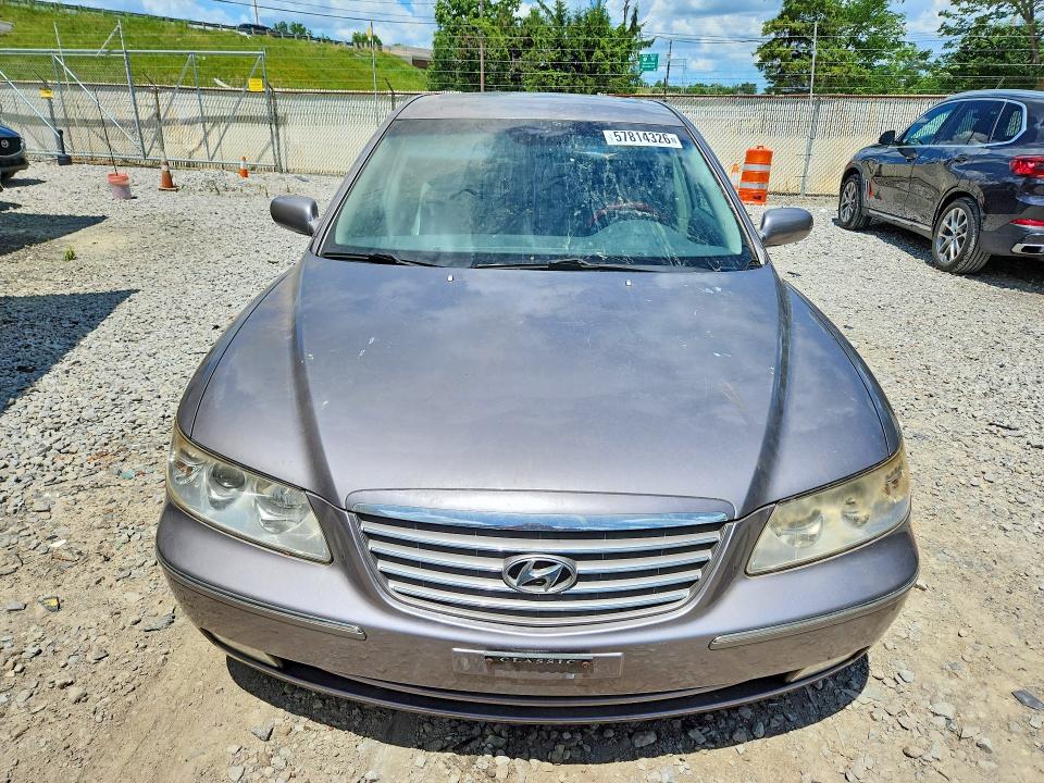 2006 Hyundai Azera VIN KMHFC46FX6A085934 COPART salvage auction — NORMAL WEAR, Oh - Certificate Of Title, sold $450 on 2026-07-29 (photo 5)
