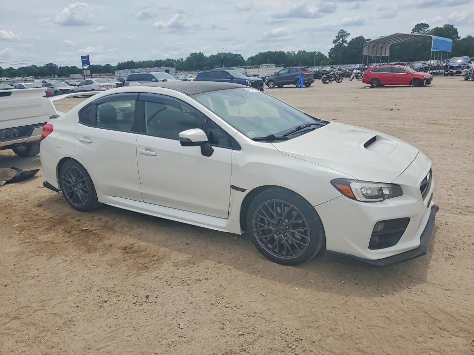 2016 Subaru Wrx VIN JF1VA2V68G9826781 COPART salvage auction — WATER/FLOOD, FL - CERT OF TITLE-SLVG REBLD FLOOD, sold $1,550 on 2026-07-30 (photo 4)