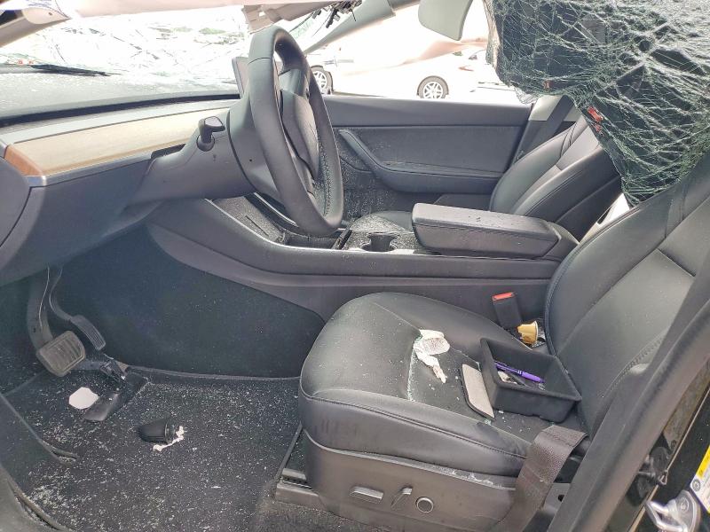 2021 Tesla Model y VIN 5YJYGDEE4MF067654 COPART salvage auction — ROLLOVER, TX - SALVAGE VEHICLE TITLE, sold $275 on 2026-07-23 (photo 7)