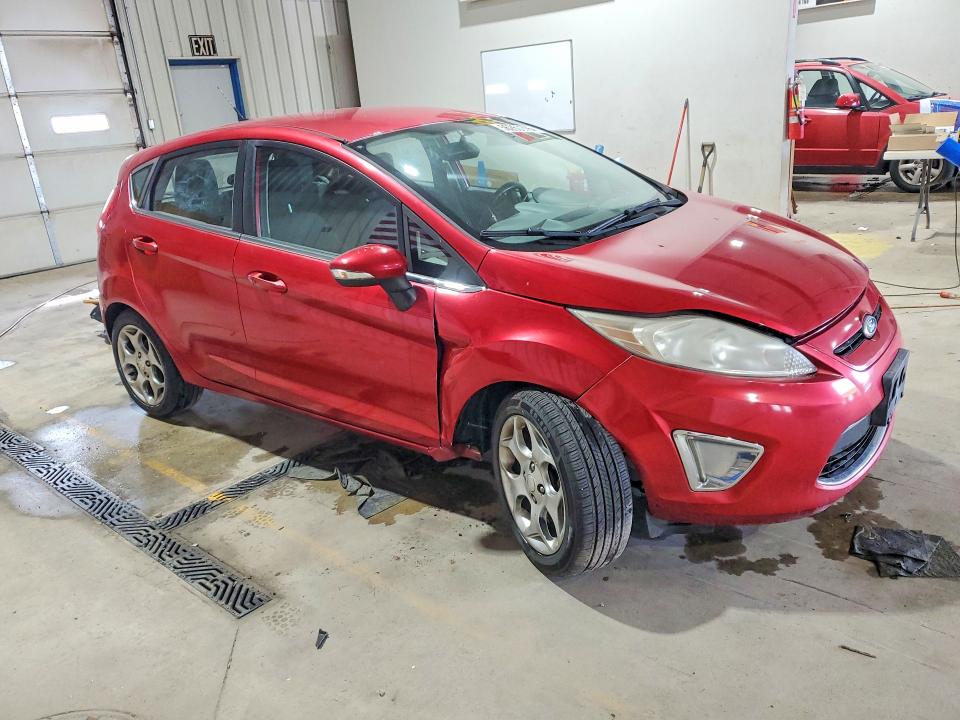 2011 Ford Fiesta VIN 3FADP4FJ8BM175686 COPART salvage auction — UNDERCARRIAGE, Pa - Certificate Of Salvage, sold $300 on 2026-07-02 (photo 4)